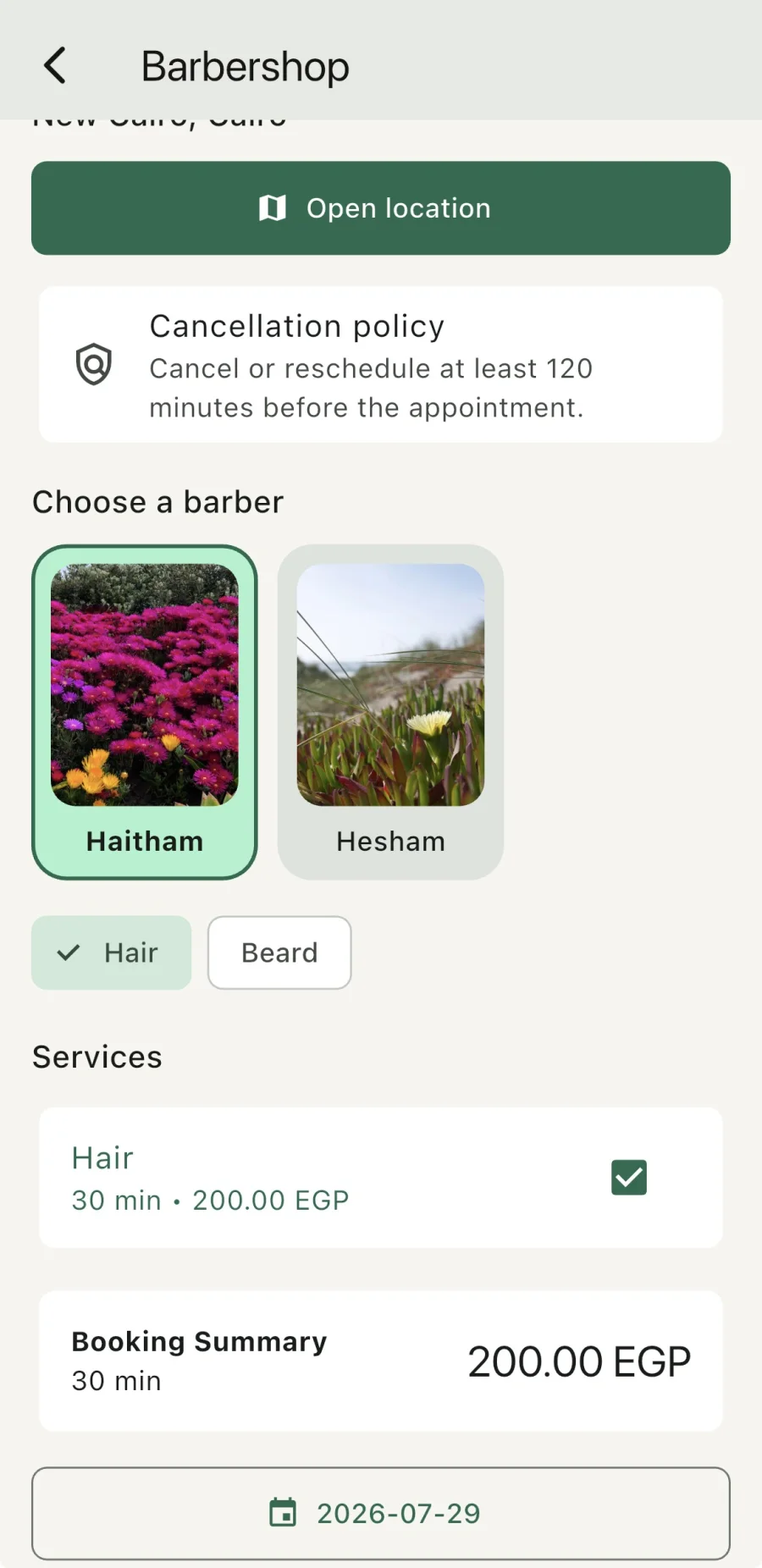 Velura shop screen showing barber and service selection